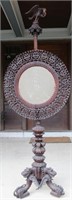 A PROFUSELY CARVED ANGLO INDIAN DRESSING MIRROR