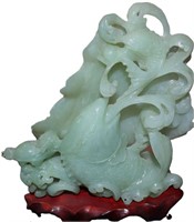 A LARGE CHINESE JADE CARVING