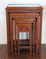 UNUSUAL HIGHLY CARVED CHINESE NESTING TABLES
