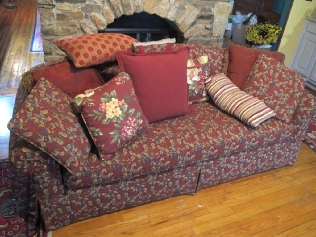 RED MATERIAL SOFA W/ 11 PILLOWS