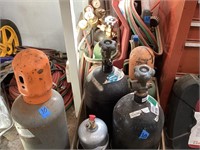 Tanks lot with gauges and hoses