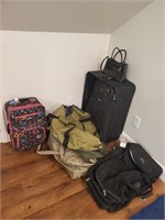 Luggage and purse lot