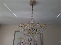 Glass chandelier with crystal prisms. 18 inches