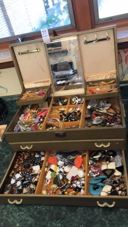 Jewelry box with pierced and clip earrings, pins