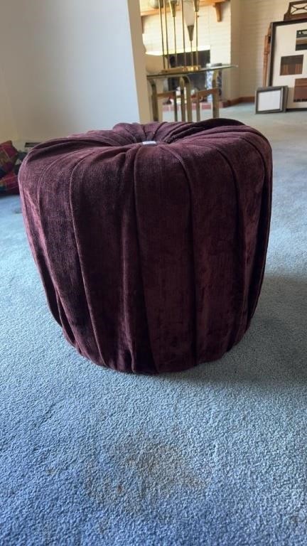 Small maroon colored footstool