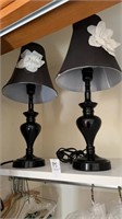 Two metal black flowered lamps
