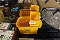 2- rolling mop wringers/buckets