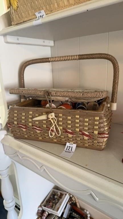 Small woven box of sewing supplies