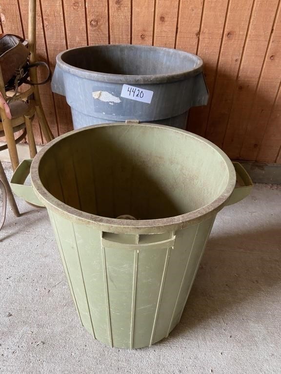 2 round plastic feed bins