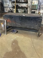 Steel storage container with locking lid on a