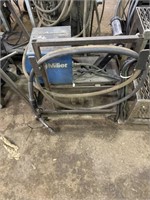 Miller 22, a 24 V wire feed on cart. See