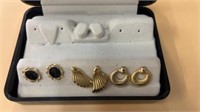 Three sets of earrings with case