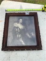 Wood framed back and white lady picture
