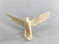 Vintage walrus ivory carving of an eagle with brok