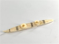 Miniature ivory canoe, once part of a larger art p