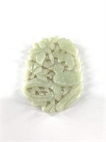Carved piece of light jade, 2"