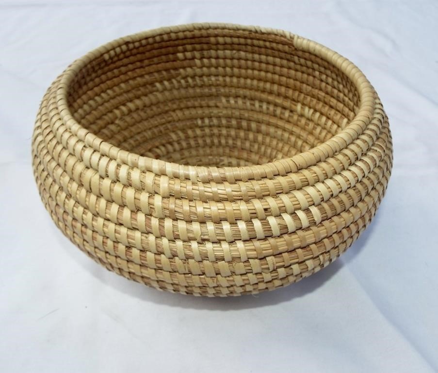 Native American basket. Measures 9" diameter and
