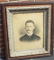 Antique Charcoal Portrait of Man in Ornate Frame.