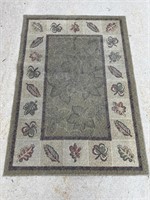 Small machine made area rug