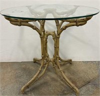 Metal table with glass top