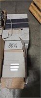 17 boxes of black and gray mixed tile