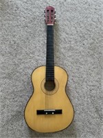 Child size guitar. T. A. Lawrence model number