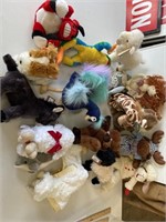 Large Clear Bin w/stuffed animals some with tags