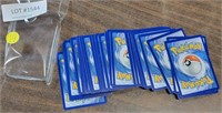 APPROX 60 POKEMON TRADING CARDS