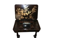 A 19TH CENTURY CHINOISERIE LACQUER SEWING STAND