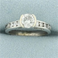 Unique Half Bezel Diamond Engagement Ring in Plati