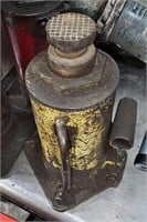 Bottle jack - hydraulic 12-ton - yellow - in shop