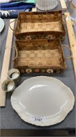 Wicker baskets, candleholders, and serving plate