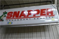 Snapper lighted sign - in middle shop