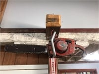 Antique Homelite chainsaw - in shop