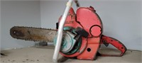 Antique Homelite chainsaw - in shop