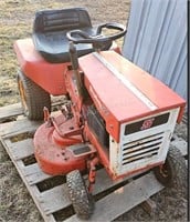 Antique riding lawn mower - orange - with deck