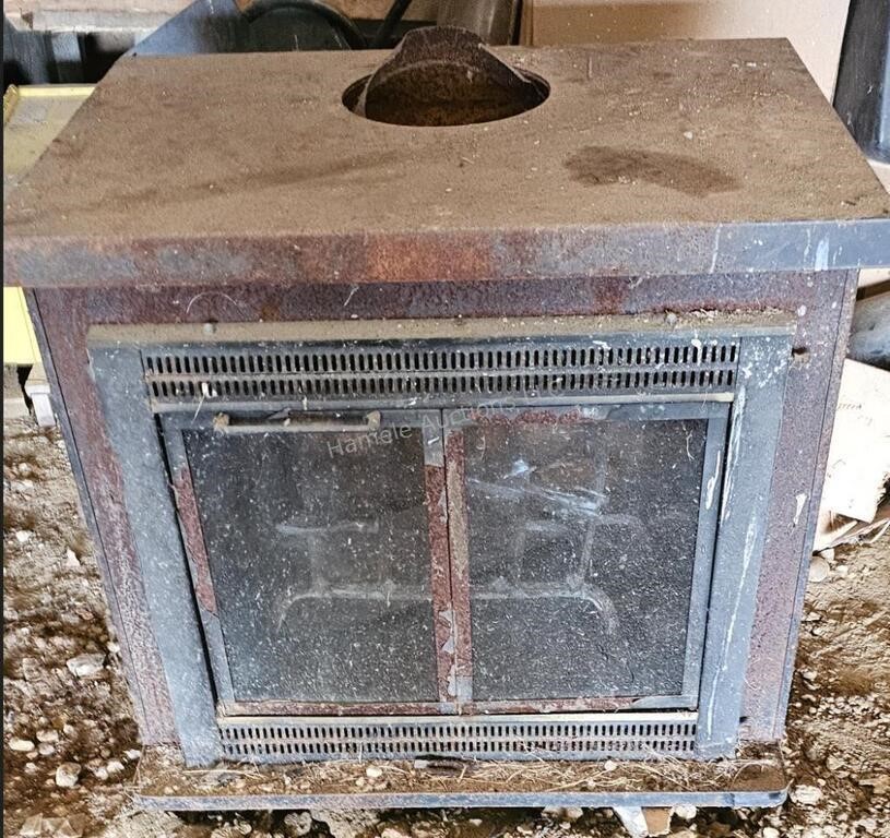 Used wood stove - in yard