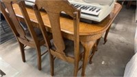 Oak table and 4 back chairs