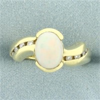 Opal and Diamond Ring in 18k Yellow Gold