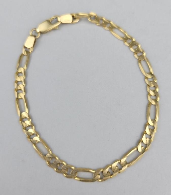 14K Gold Figaro Link Bracelet. 7 inches long. 5.8