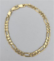 14K Gold Figaro Link Bracelet. 7 inches long. 5.8