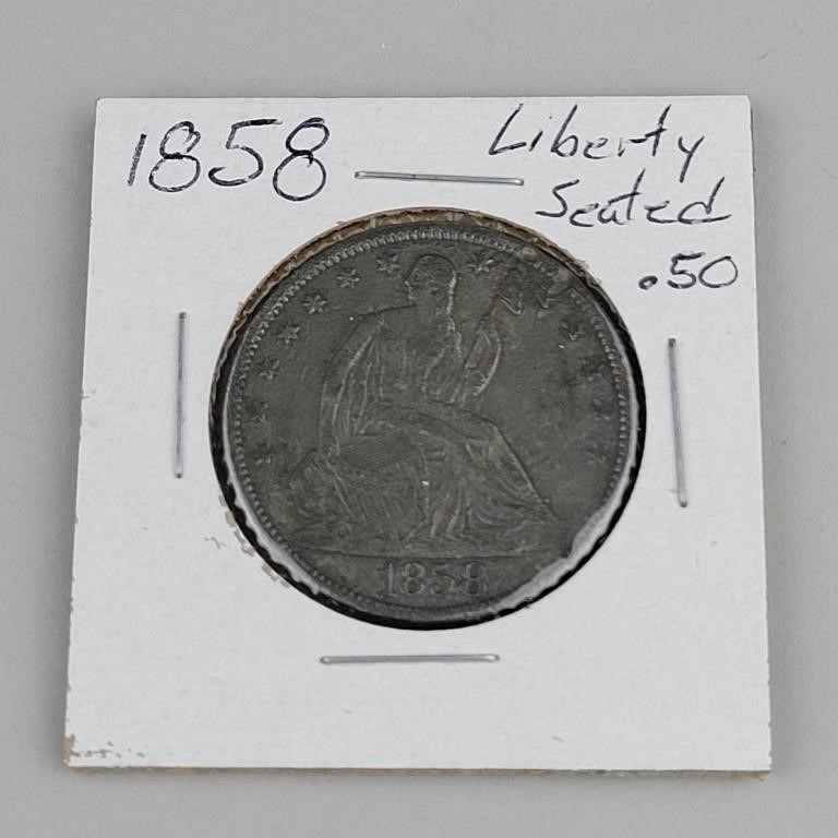 1858 Seated Liberty Half Dollar.