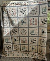 QUILT WITH APPLIED DUCKS, TREES AND FLOWERS