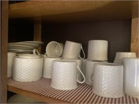 Miscellaneous coffee cups and small plates