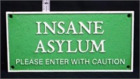 Cast iron Insane Asylum sign