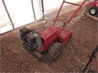 Gas powered rotol tiller.