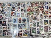 Mixed sports cards in pages with stars