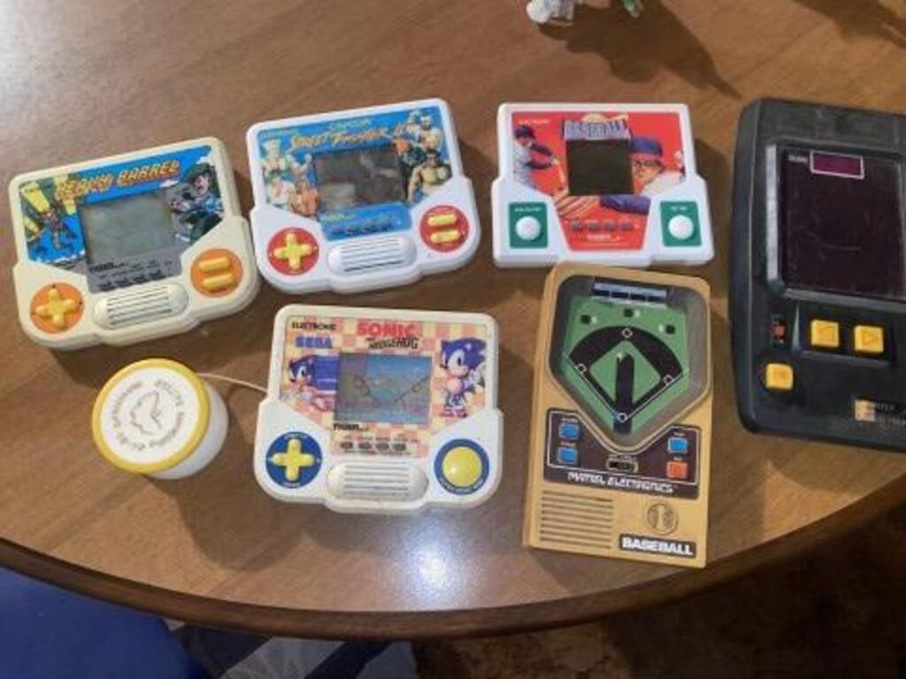 Vintage handheld games Street Fighter, Sonic.