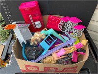 Box with Barbies and accessories