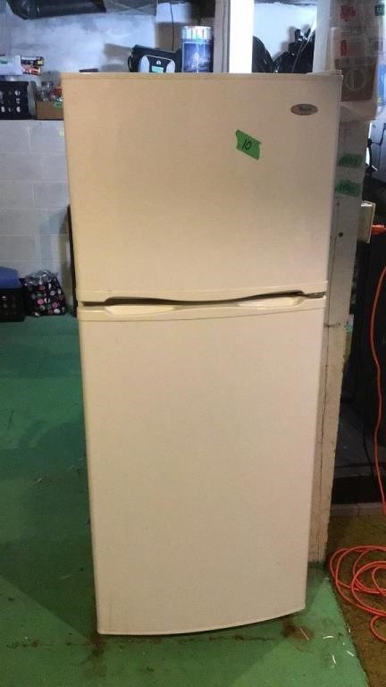 Smaller Refrigerator. 24.5x25x59.5. IN BASEMENT